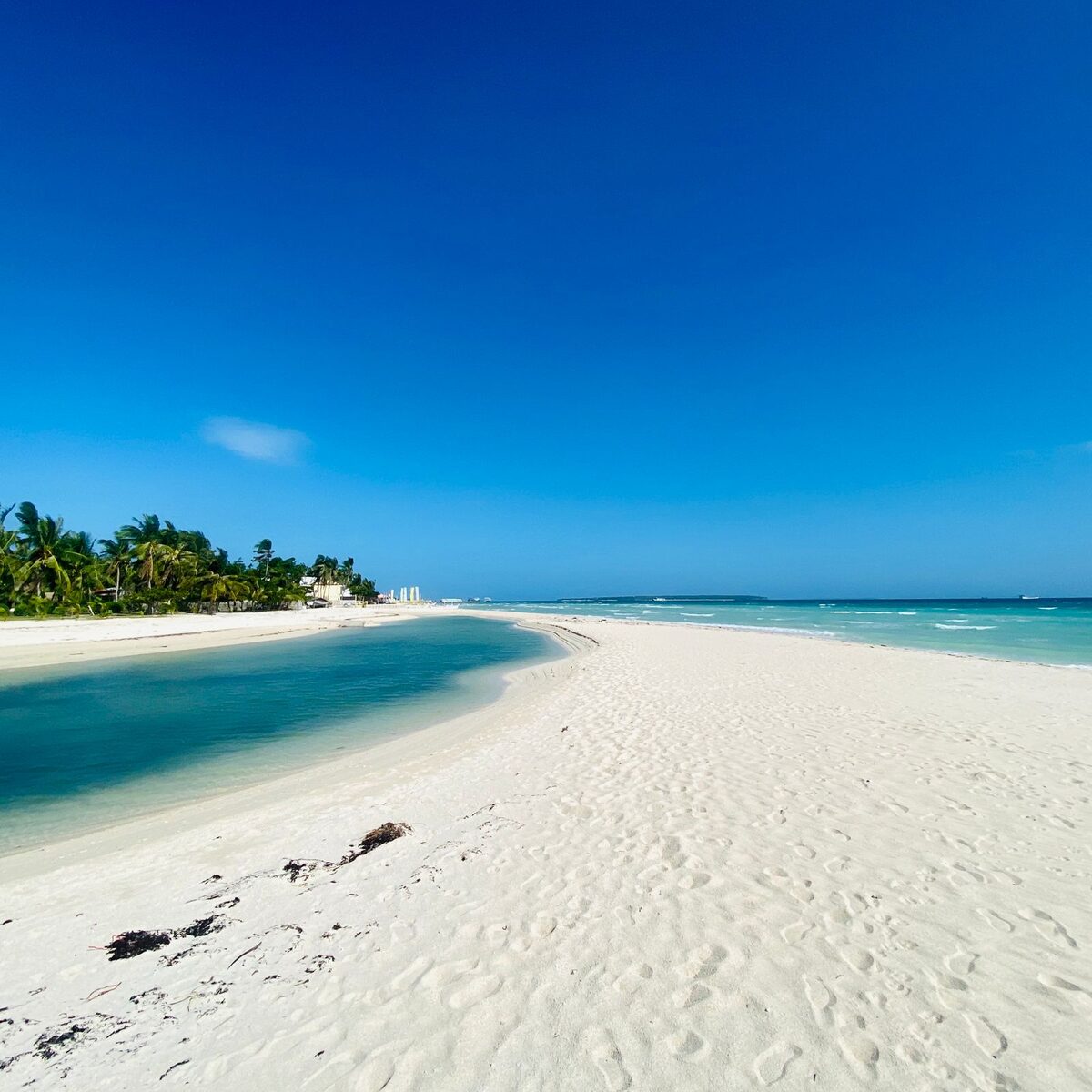 Secluded beach with a shallow reef just offshore